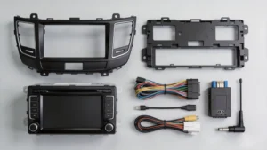 Complete car stereo installation kit including head unit, dashboard kit, wiring harness, CAN Bus decoder, and antenna adapter for aftermarket installation