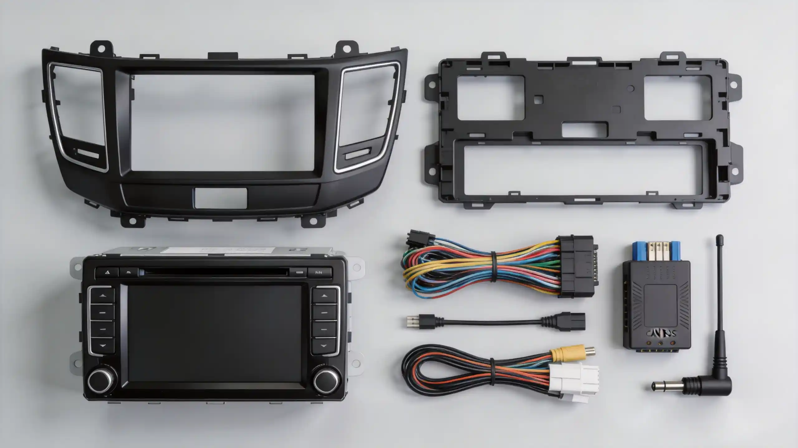 Complete car stereo installation kit including head unit, dashboard kit, wiring harness, CAN Bus decoder, and antenna adapter for aftermarket installation